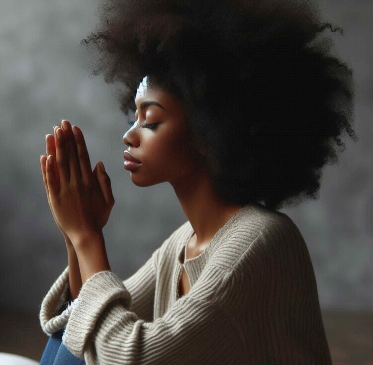 a woman praying to God
