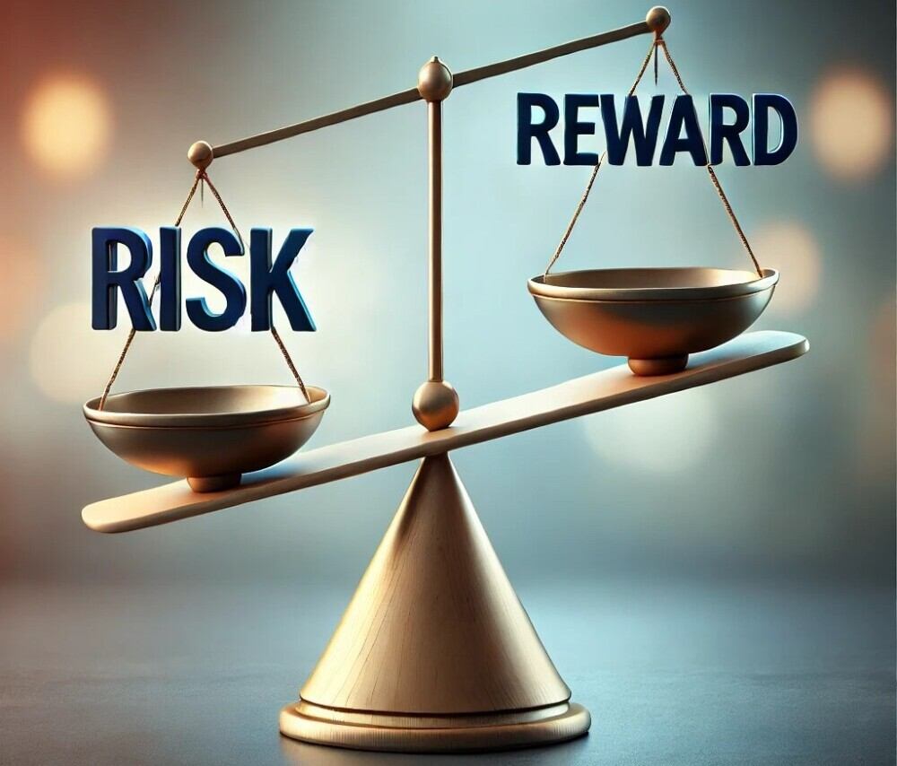 balance scale with the word risk on the left and reward on the right