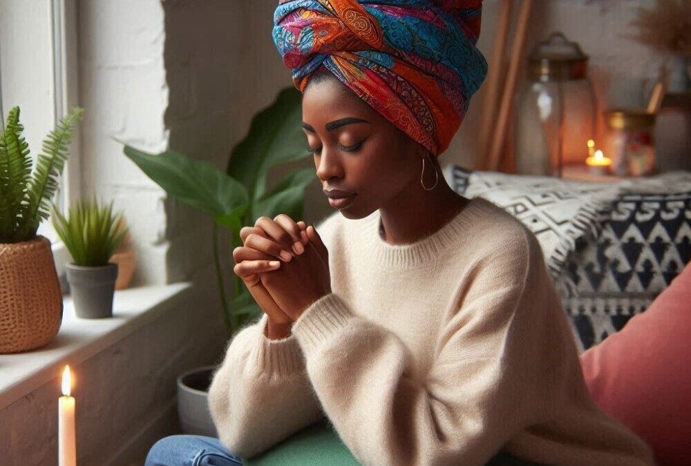 woman praying over financial decisions at home in her living room